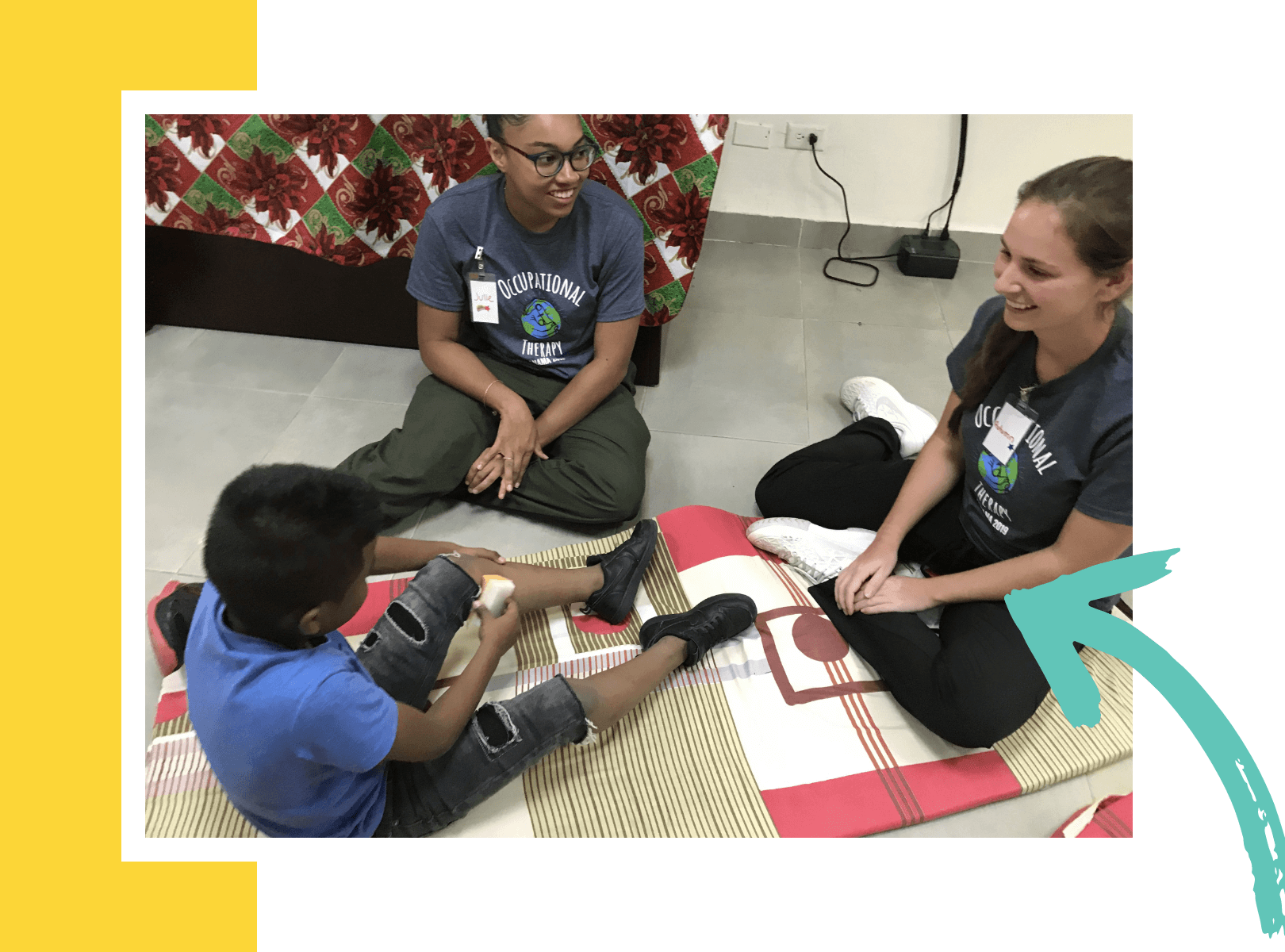 Students interacting with a child.