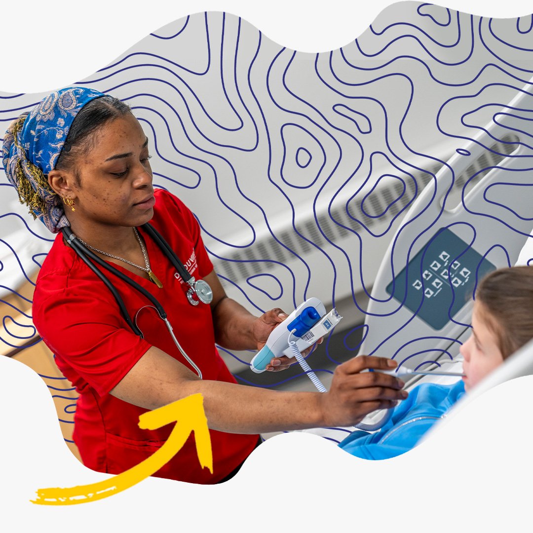 Student in nursing simulation lab.